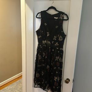 Floral embroidery cocktail dress.  Embroidery in deep maroon and gold.